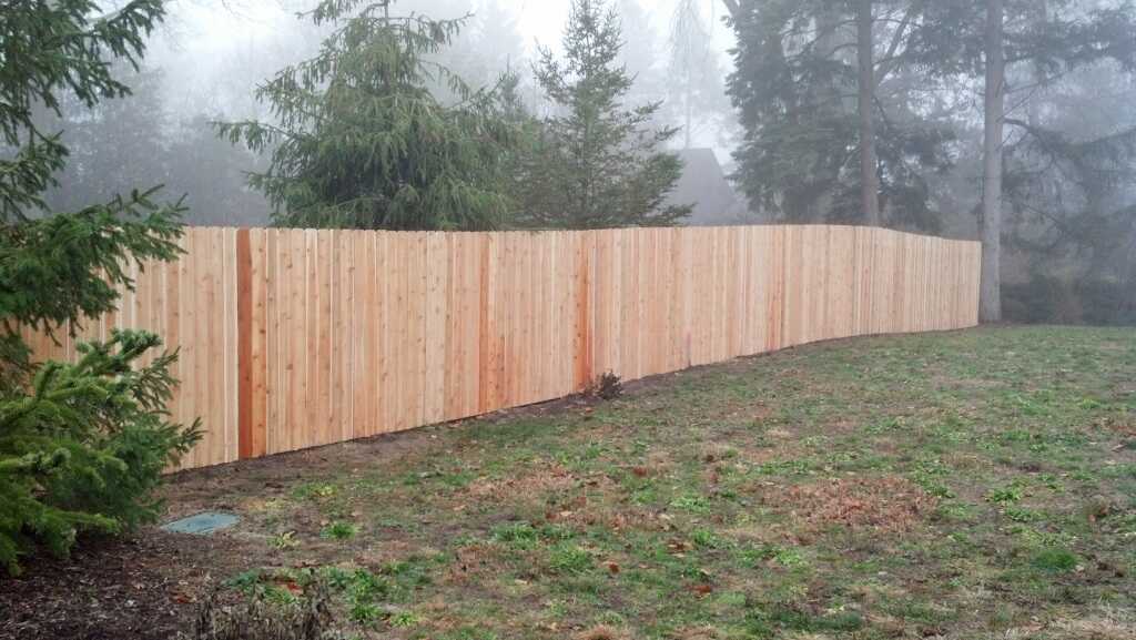 A long custom wooden fence.